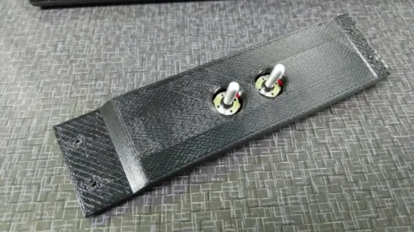 3D Printed bracket with the Wagon Power Mirror PCB installed. Front Side. 3D Printed bracket with the Wagon Power Mirror PCB installed. Front Side.