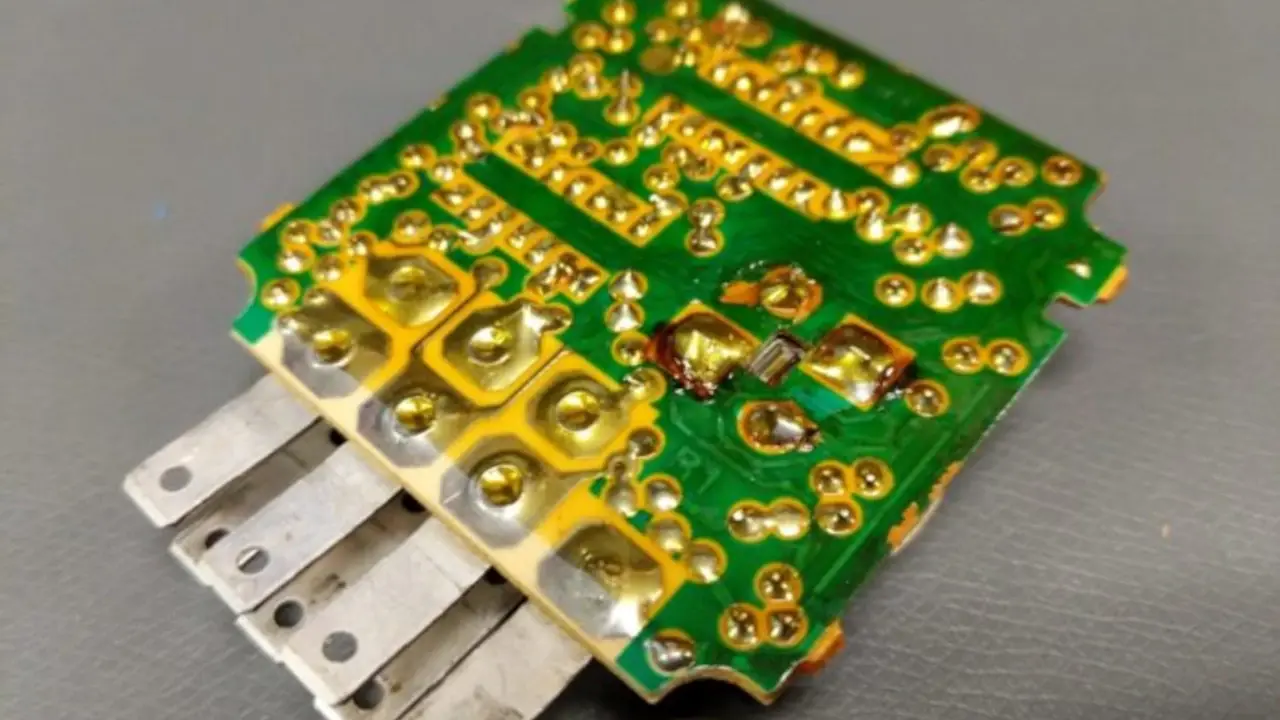 Backside of the chime module PCB. Easiest way to remove the conformal coating? Backside of the chime module PCB. Easiest way to remove the conformal coating?