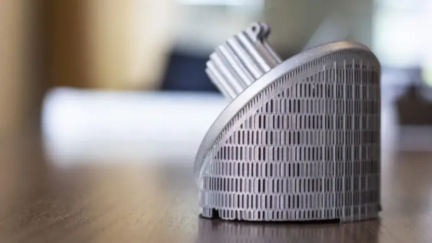 DMLS (metal 3D printing) aluminum alloy with support structures. DMLS (metal 3D printing) aluminum alloy with support structures.
