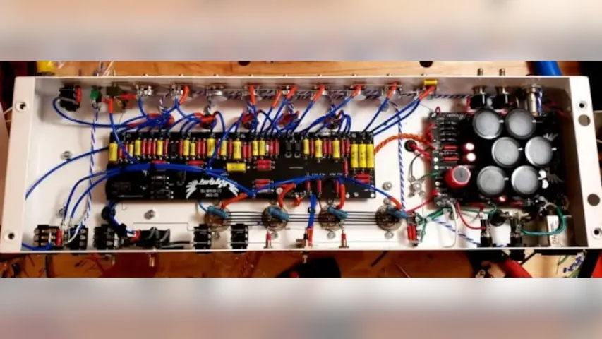 Inside the amplifier Stephen rebuilt recently. Mike Ikes for resistors and capacitors! Inside the amplifier Stephen rebuilt recently. Mike Ikes for resistors and capacitors!