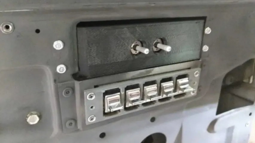 Installed into the door and wired to the mirrors and power. Installed into the door and wired to the mirrors and power.