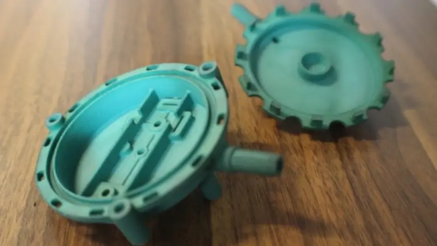 SLS printed enclosure dyed green. SLS printed enclosure dyed green.